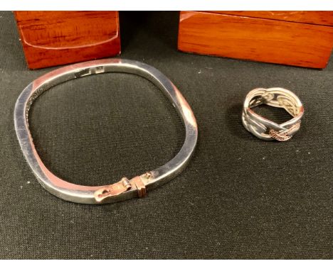 A Clogau Welsh silver Cariad box bar hinge bangle;  similar diamond accented silver and rose metal Celtic knot ring,  size N,