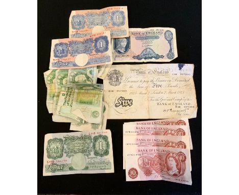 A Bank of England 1945 White Five Pound Note, chief cashier K.O.Peppiatt, H56 097200, USED;  ten  Bank of England Ten Shillin
