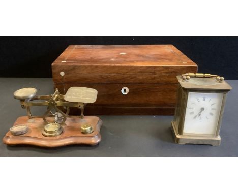 An early 20th century French carriage clock, c.1900;  a set of Postal scales;  a Victorian rosewood work box, mother-of-pearl