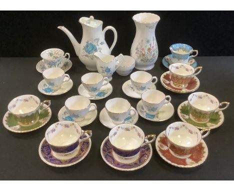 A Paragon tea service, for six, each in an alternate colour, picked out in gilt, printed  marks;  an Aynsley Wild Tudor vase;