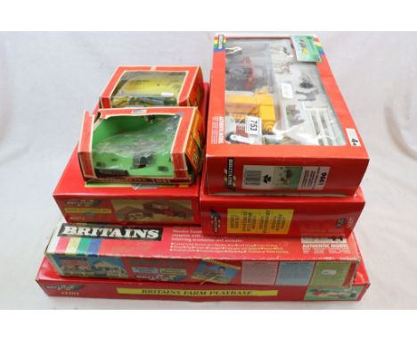 Seven boxed Britains farming sets and models to include 42104 Farm Playbase, Farm Set with wooden buildings, 9661 Massey Ferg