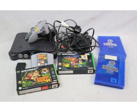 Nintendo N64 console plus 2 boxed games (Donkey Kong 64 &amp; Banjo-Kazooie plus Super Mario 64 and WCW/NWO Revenge and a con
