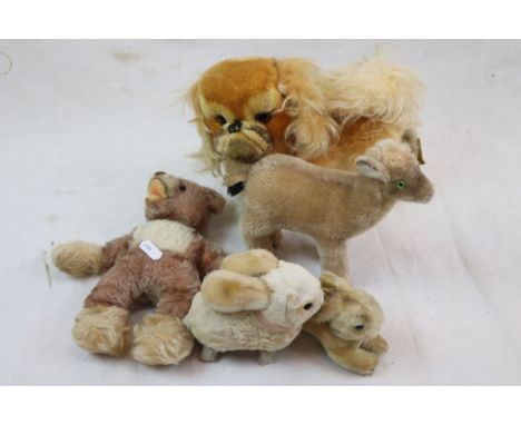 Four vintage Stieff soft toys to include Pug Dog, Llama, Teddy Bear and Bunny Rabbit, plus a clockwork rabbit.  Four Stieffs 