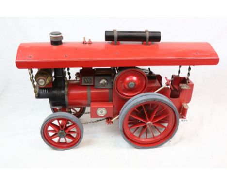 Scratch built steam engine model in red, wooden and tin with metal fittings, 26" in approx length 