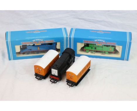 Two boxed Hornby Thomas The Tank Engine OO gauge locomotives featuring R351 Thomas and R350 Percy plus an unboxed Diesel, Ann