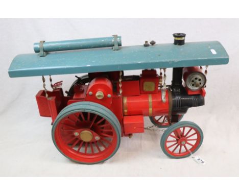 Scratch built Steam Engine model in red, wooden and tin with metal fittings, 25" in approx length 