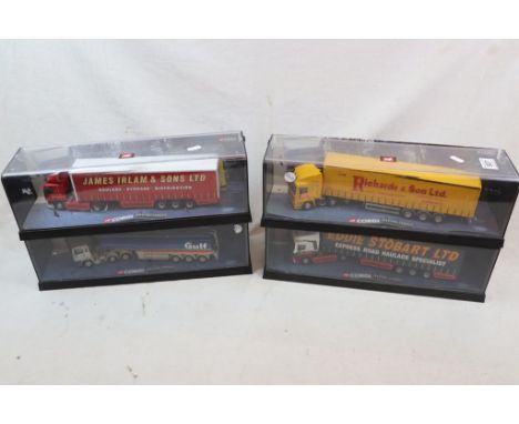 Four cased Corgi Modern Trucks to include 75201 Eddie Stobart ERF Curtainside, 75101 Gulf Oil ERF Tanker (with certificate), 