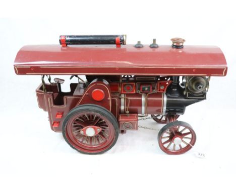 Scratch built 'The Burrell Tractor' steam engine model in Burgundy, wooden and tin with metal fittings, 24" in approx length 