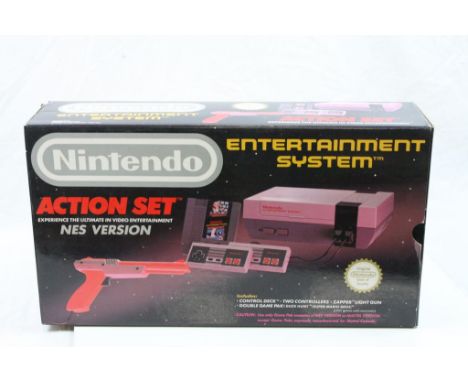 Boxed Nintendo NES console Action Set complete with two controllers and instructions