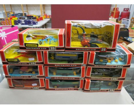 Ten boxed Britains Farm Implements to include 1:32 9556 Betteleuse Hay Baler, 9542 Forage Harvester, 9546 Ploughs, 9539 Seed 