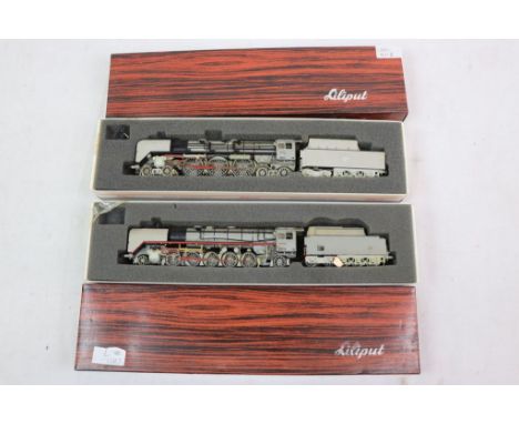 Two boxed Liliput HO scale locomotives to include 4502 2-10-2 in grey and 10502 4-6-4 in grey both with paperwork