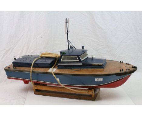 Large wooden model boat fitted with a Challenger engine, on stand&nbsp;