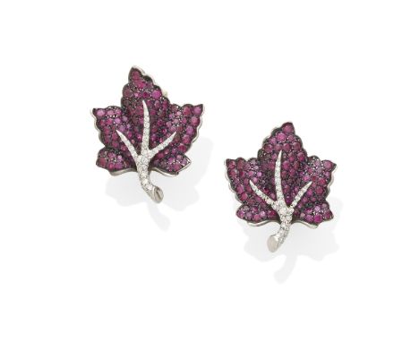 A pair of ruby leaf ear clips, Mouawad mounted in 18k bi-color gold; dimensions: 1 1/8 x 1in.; makers mark: Mouawad