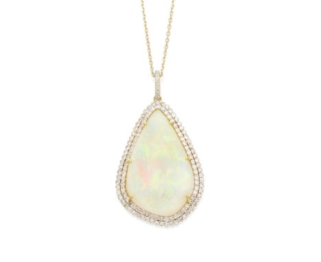 An opal and diamond pendantcentering a free-form cabochon-cut opal weighing 21.29cts;  mounted in 18k gold; estimated total d