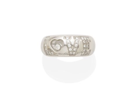 A Happy diamond 'love' ring, Chopard mounted in 18k white gold; size: 5; signed: Chopard; numbered: 82/2899-20