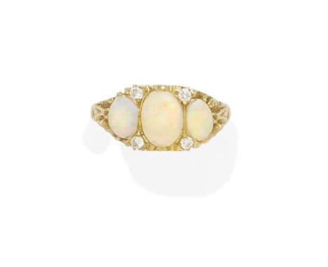 An opal and diamond ring mounted in 18k gold; size: 7 1/2 