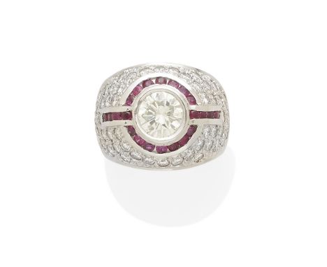 A diamond and ruby ringcentering a round brilliant-cut diamond approximately 2.20cts; mounted in platinum; estimated remainin