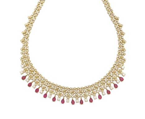 A diamond and ruby bib necklacecentering thirteen pear brilliant-cut rubies measuring approximately 6.92 x 4.80 x 3.34mm; mou