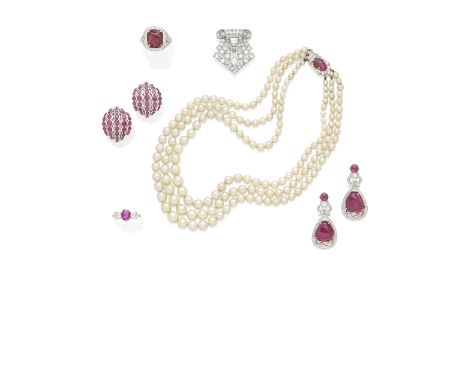 A pair of ruby and diamond ear pendantscentering two free-form ruby cabochons measuring approximately 13.91 x 13.87 x 8.12mm;