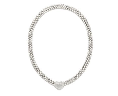 A diamond 'Happy Diamond' necklace, Chopardcentering a pavè diamond heart at center containing three bezel set floating diamo
