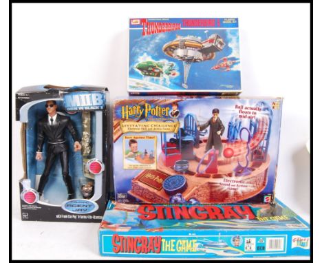 An assorted collection of vintage &amp; contemporary TV / film related games &amp; kits to include; Imai Thunderbird 5 kit, M