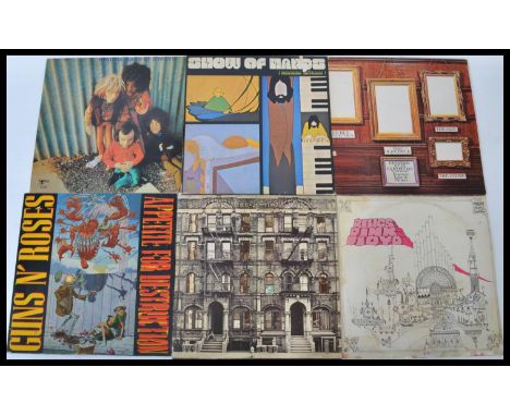 A collection of vinyl long play LP records to include Led Zeppelin Physical Graffiti, Jimi Hendrix Band Of Gypsys ( Puppet Sl