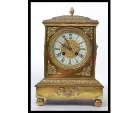 A 19th century French Japy Freres ormolu gilt bracket 8 day movement mantel / table clock raised on bun feet with acanthus le