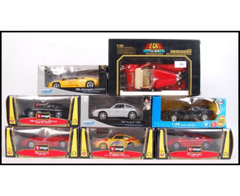 A collection of boxed 1:20 &amp; 1:24 scale Burago &amp; Welly Diecast diecast model vehicles comprising of; 3020 Mercedes Be