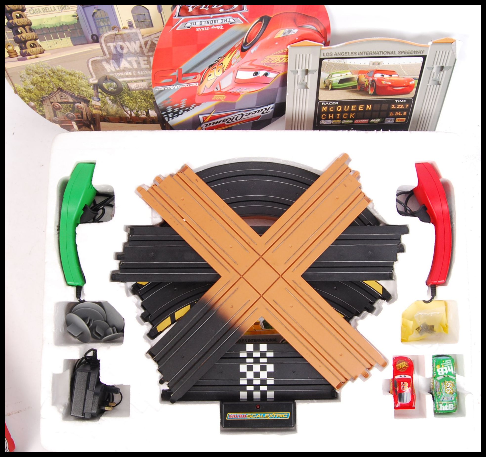 Two Micro Scalextric slot car racing sets comprising of; ' The World of
