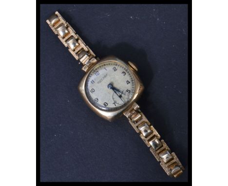 A vintage 20th century ladies 9ct gold Rotary cocktail watch set on an extendable rolled gold bracelet.