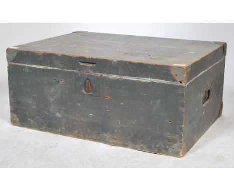 A 20th century painted pine German military ammunition box with grey painted finish all over, the hinged top with notation in