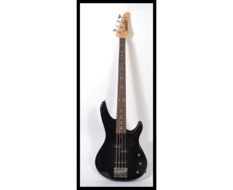 A Yamaha electric Bass guitar RBX-350 model. Black body, with mother of pearl style fret inlays. 4 string, with three pickups