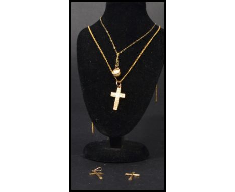 A collection of vintage 20th century hallmarked 9ct gold and yellow metal items to include crucifix's ( 2 gold ) 9ct gold nec