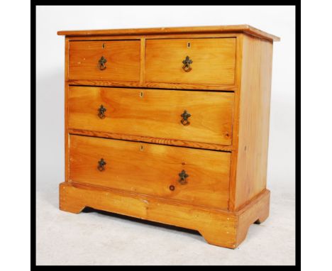 A Victorian Arts &amp; Crafts pine cottage chest of drawers having 2 short over 2 deep drawer configuration. Good brass archi