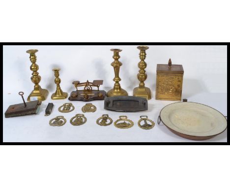 A collection of vintage and antique brass wares to include a Pot Office set of postage scales, 19th century&nbsp; candle stic