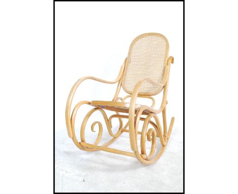 A vintage 20th century Thonet style light&nbsp; bentwood rocker / rocking chair with bergere /&nbsp; rattan weave seat and ba