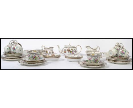 An early 20th century Aynsley bone china part service, to include  plates, cups, saucers, teapot , sugar bowl , creamer jug e