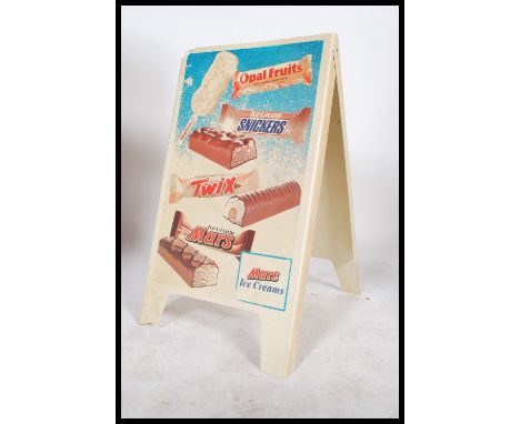 A vintage retro 20th century advertising point of sale shop display double sided sign having various ice lollies and ice crea
