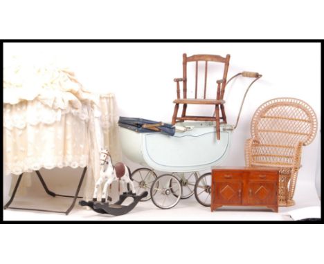 A good collection of assorted large scale doll's items to include - chairs, furniture, wicker chairs, tinplate pram, a vintag