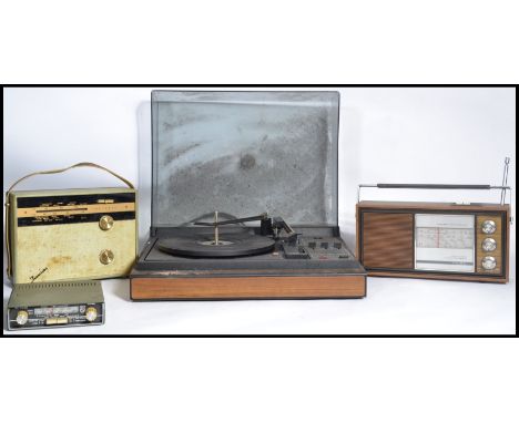 A group of vintage 20th century retro radios , record players etc. along with a pair of vintage speakers. Record player measu
