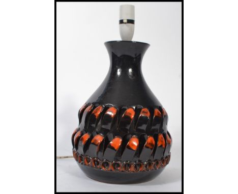 A vintage mid 20th century West German ' Fat Lava ' style table lamp having drip glaze design complete with the shade. Measur