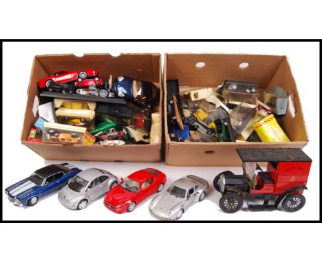 A large collection various branded diecast model vehicles to include; Buragos, Britains, Matchbox Models of Yesteryear, Solid