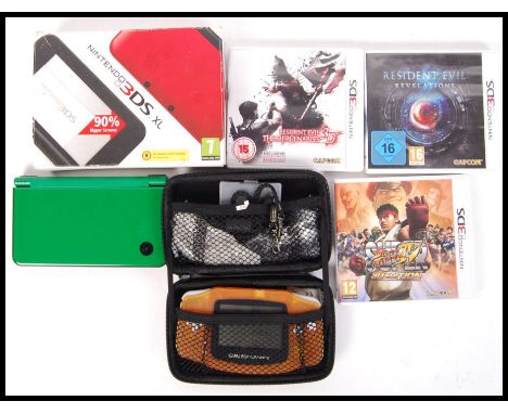 A collection of Nintendo related consoles &amp; games to include; boxed red Nintendo 3DS ( console only), green 3DS, 3x games
