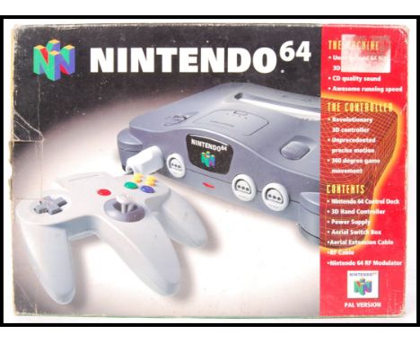 An original retro Nintendo 64 games console, within the original box. Missing power cable, but otherwise complete. Also to in