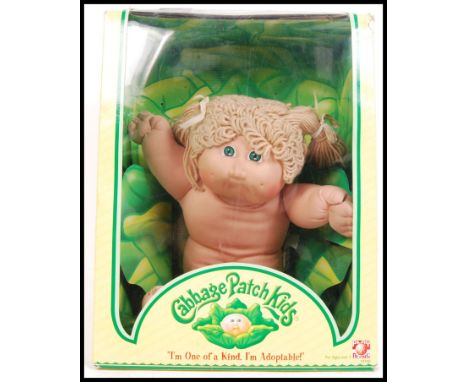 An original vintage Play Along made ' Cabbage Patch Kids ' doll. Within the original box.&nbsp;