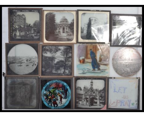 A collection of vintage early 20th century hand coloured glass plate magic lantern slides to include nursery rhymes , animals