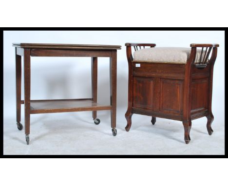 An Edwardian 20th century piano stool together with a similar aged card table raised on castors.&nbsp;Measures: 63cm high x 6