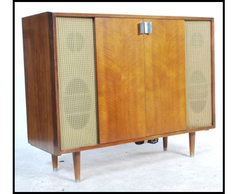A mid 20th century teak wood record player cabinet / stereogram by Murphy having a good facia with inset Garrard D10 record p