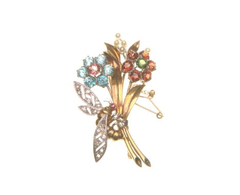 A multi-gem set floral spray brooch, possibly by Cropp & Farr
The circular-shape gem-set floral clusters, with seed pearl hig
