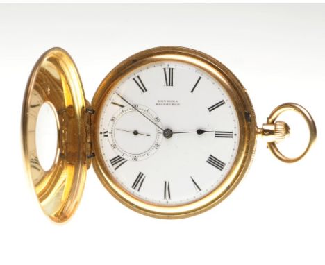 An 18ct gold half hunter keyless wind pocket watch
The white enamel dial with black Roman numerals and outer minute divisions